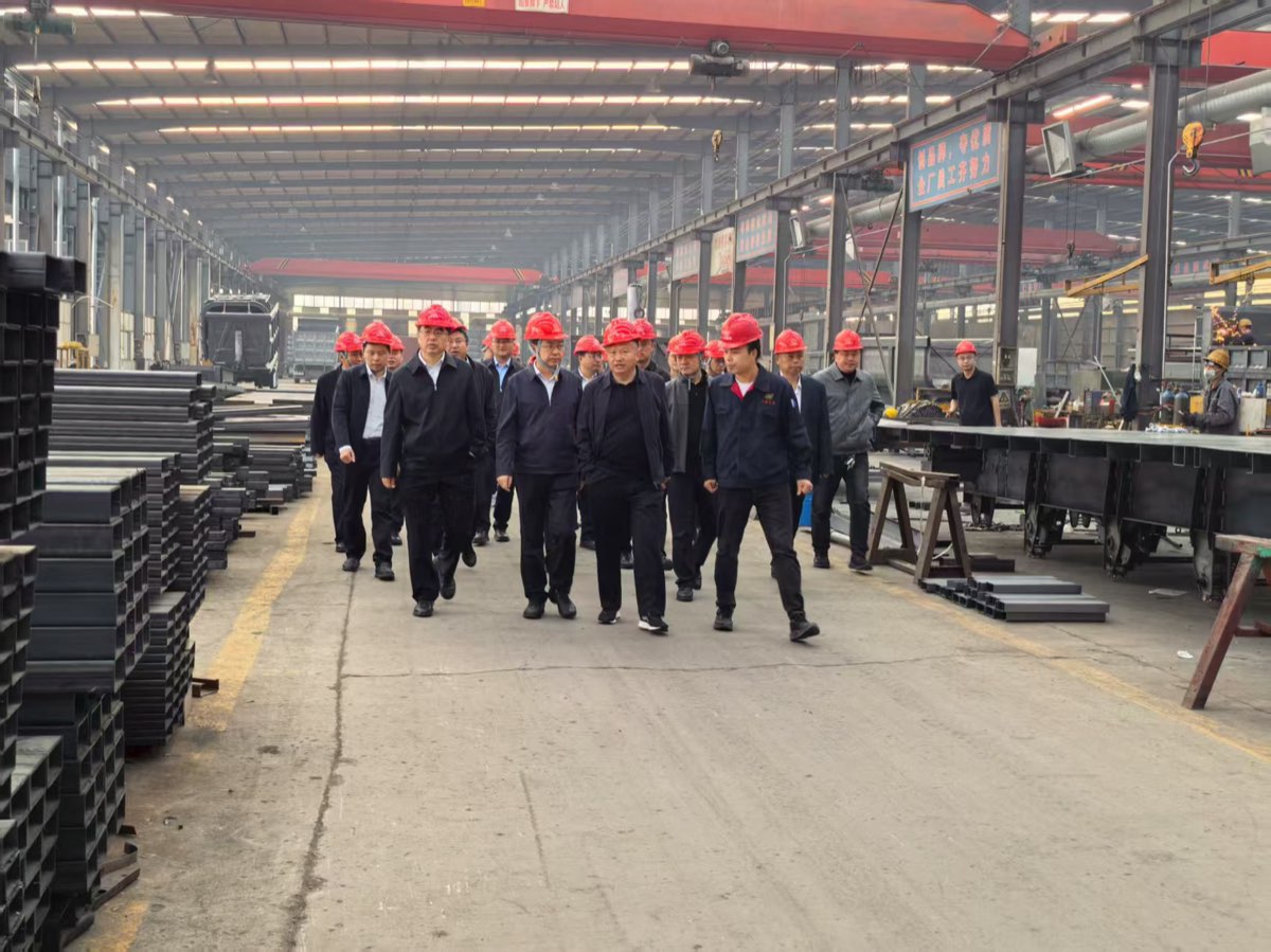 Leaders inspect production facility